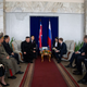 Kim Jong Un attends a meeting with Russian officials, including the Minister for the Development of the Russian Far East Alexander Kozlov (4th R) and governor of Primorsky Region Oleg Kozhemyako (2nd R), in the settlement of Khasan, Russia, April 24, 2019.